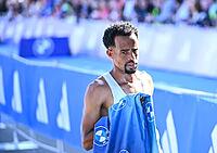 27 September 2026, Athletics: BMW Berlin Marathon 2026 – from left to right: Gemechu Dida Diriba (ETH) finishes second, exhausted, at the 2026 BMW BERLIN MARATHON [IBR113453127]