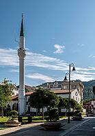 Marmaris, Turkey, 19.06.2026. Historical white mosque building with a tall minaret standing next to a green square on a sunny summer morning in Marmaris resort [IBR125492344]