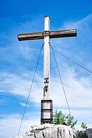 Wooden cross on the summit near Kampenwand, a famous mountain near Lake Chiemsee in Germany [IBR125492387]