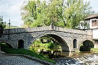 Old stone bridge over river in old town of Tryavna, Bulgaria [IBR125492408]