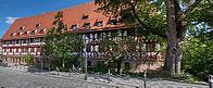 Historic wine bar, originally a special infirmary for lepers, built 1446 to 1448, wine warehouse from 1571, one of the largest medieval half-timbered buildings in Germany, Maxplatz, Nuremberg, Middle Franconia, Bavaria, Germany [IBR125501611]