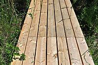 Detailed close up view on different wood surfaces showing planks logs and wooden walls in high resolution [IBR125501624]