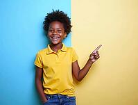 Studio portrait of a cheerful young girl pointing her finger towards copyspace on a colorful background, AI generated [IBR125502140]