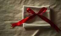 A folded napkin with a red bow on textured fabric, suggesting a sophisticated table decoration, AI generated [IBR125502141]
