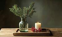 Simple dining table with a small glass vase filled with pine branches and red berries, AI generated [IBR125502202]