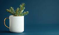 White mug with a golden handle and a sprig of fir on top, set against a deep blue background with soft natural light, AI generated [IBR125502218]