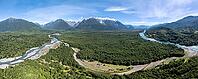 Aerial view, Rio Yelcho river at the end of Lago Yelcho, picturesque mountains with snow-capped peaks, Puerto Cardénas, Carretera Austral, Patagonia, Los Lagos, Chile [IBR125521095]