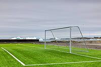 Football field in front of iceberg, goal, artificial turf, Quaqertarusaq, Disco Island, West Greenland, Greenland [IBR125521127]