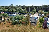 Overcrowded parking lot at Bagno Vela beach house on the Adriatic Sea, Punta Marina, Ravenna, Emilia-Romagna, Italy [IBR125521170]
