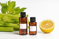 Lemon and celery oil extract lotion for body and face care. Health beauty treatment and care concept [IBR125527052]