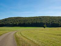 Beautiful country road on Schwaebische Alb cycling trail in Southern Germany [IBR125527080]