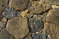 Himeji, Japan - Sep 24 2024, Close-up view of the cobblestone fortress wall, consisting of large stones, without people, in the daytime, Himeji, Japan [IBR125527107]