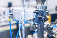 Many pneumatic hose fittings that connect to air or water hoses are installed on pneumatic equipment on a production line [IBR125536404]