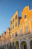 03 October 2026, Historic Renaissance facades glow in golden hour light on the main square in Telč, Czech Republic [IBR125536409]