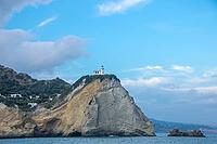 Cape Miseno and its lighthouse, the land marking the north-western border of the Gulf of Naples and Pozzuoli Bay in southern Italy [IBR125536471]