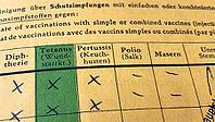 German international vaccination certificate with missing records for measles and polio [IBR125566031]
