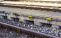 Railroad tracks near train platform, closeup detail [IBR125566072]