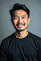 Studio portrait of a cheerful asian man with a goalee, showcasing a Genuine smile and modern hairstyle, AI generated [IBR125592743]