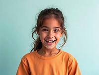 Studio portrait of happy young girl with braided hair, smiling on light green background, AI generated [IBR125621277]
