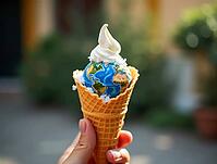 Ice cream cone with earth globe as ice cream scoop raising awareness for climate change and global warming, AI generated [IBR125621340]