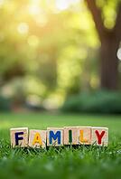 Colorful family word written on wooden alphabet blocks placed on green grass with blurred bokeh background, AI generated [IBR125621352]