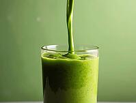 Pouring nutritious green smoothie into glass on green background: health and wellbeing concept, AI generated [IBR125636918]