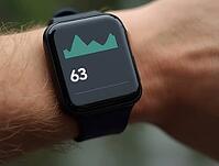Close-up of smartwatch displaying heart rate and calories burned during an intense workout, AI generated [IBR125636933]