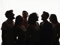 Six happy friends are laughing together, showing their joy and happiness in a backlit silhouette, AI generated [IBR125636941]