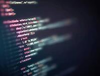 Shallow depth of field highlighting lines of code on a computer monitor, representing software development and programming, AI generated [IBR125636948]