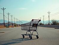 Empty shopping cart standing in the middle of a deserted parking lot, symbolizing economic downturn or retail apocalypse, AI generated [IBR125653405]