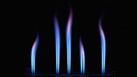 Close up of blue and purple flames rising from a burner against a dark backdrop, creating a mesmerizing visual, AI generated [IBR125653498]
