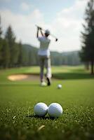 Golf balls lying on a green with a golfer swinging a club in the background on a sunny day, AI generated [IBR125653502]