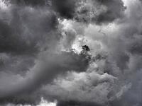 Dramatic stormy sky with dark clouds useful as a background [IBR125654770]