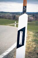 Roadside lead post in winter [IBR125654819]