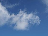 Blue sky cloudscape useful as a background [IBR125654844]