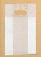 Transparent plastic bag over light brown background [IBR125654845]