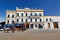 Restaurant, café on Moulay Hassan Square, historic buildings in the old town, UNESCO World Heritage Site, passers-by, coastal city of Essaouira, Morocco [IBR125657394]