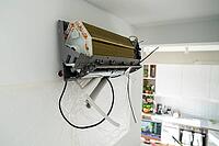 Installation air conditioning system on white wall in apartment, office closeup. Technology inverter air conditioning system in apartment. Ventilation replacement in house. Controlling temperature [IBR125657400]