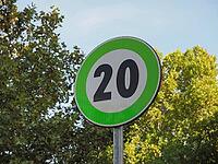 New green bordered speed limit signs indicating advisory speeds not mandatory limits [IBR125659452]