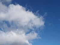 Blue sky cloudscape useful as a background [IBR125659471]
