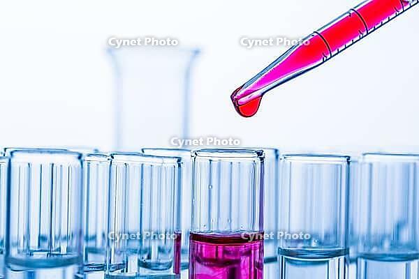 Many test tubes during an experiment in a university research laboratory. Symbolic photo for learning and research, pipette studio photo, Austria, Europe [IBR121845239]