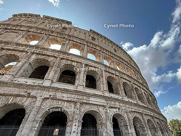 Majestic Colosseum, taken from below with a view of its arches and the sky, Rome, Italy, Europe [IBR122278703]