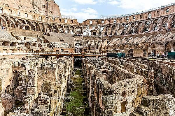Rome, Italy - June 19, 2018: Roman Coliseum, The Eternal City of Rome. The historic architecture of the city of Rome, antique statues and buildings [IBR122970607]
