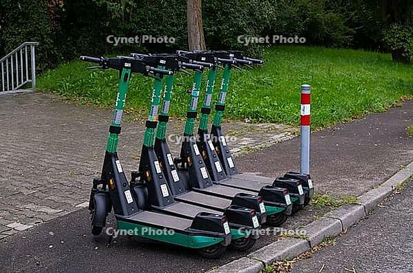 Several e-scooters, electric scooters, scooters parked on the pavement, pavement, in the Bolt bike hire shop, Stuttgart, Baden-Württemberg, Germany [IBR112672574]