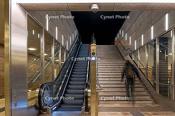 Night photo, long exposure with motion blur, modern underground entrance at Unter den Linden station, contemporary design with stairs and escalator, Berlin, Germany [IBR112672578]