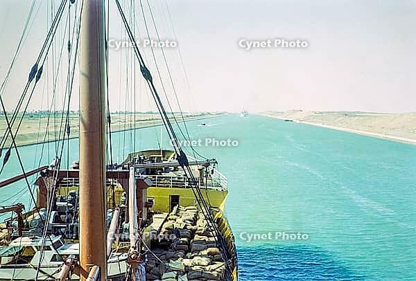 Shipping passing through the Suez Canal photographed onboard a cargo ship, Egypt, norther Africa 1965 [IBR112672609]