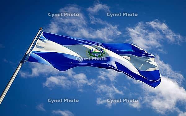 Beautiful national state flag of El Salvador fluttering at sky background. Low angle close-up El Salvador flag 3D artwork [IBR123569266]