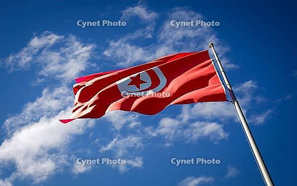 Beautiful national state flag of Tunisia fluttering at sky background. Low angle close-up Tunisia flag 3D artwork [IBR123569269]