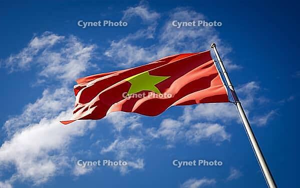 Beautiful national state flag of Vietnam fluttering at sky background. Low angle close-up Vietnam flag 3D artwork [IBR123569287]