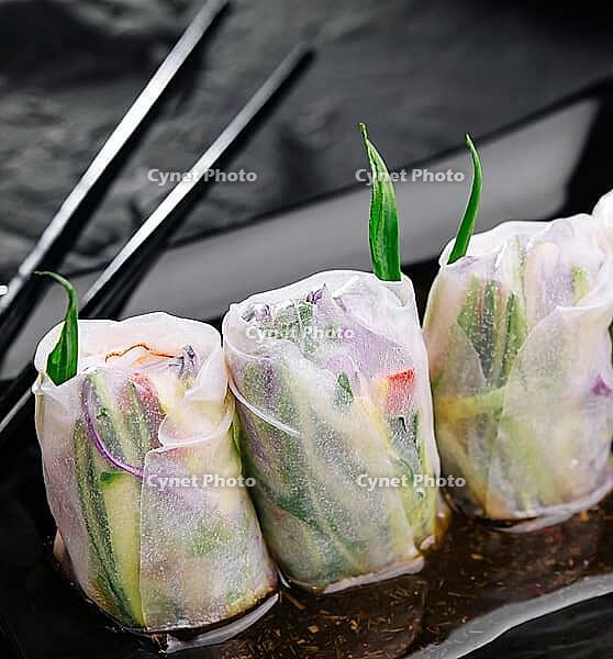 Food, Vietnamese spring rolls on black plate [IBR123622452]